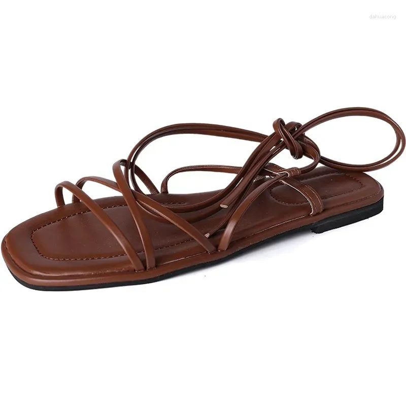 DHgate Trendy Strappy Sandals 2024 Flat Bottom Summer Roman Shoes for Women Shoes Accessories