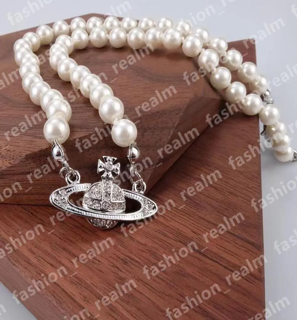 Perlenhalsketten Stift Saturn Perlen Anhänger Halskette Frauen Diamant Kupfer 18K Gold plattiert Designer Schmuck Schlüsselblatt Mutter von Perle 3835296