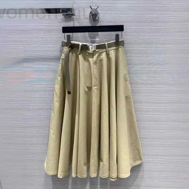 Skirts designer Nanyou Gaoding 2024 Spring/Summer New Back Metal Micro Label Age Reducing Versatile Large Skirt Hem Belt Umbrella Half skirt Y0IO