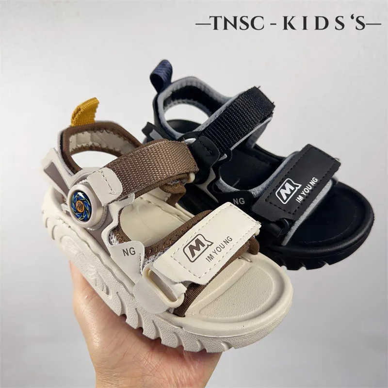 Sandals Chaussures pour enfants 2024 Été Nouvelle plage Middle et grande école Open Toe H240510