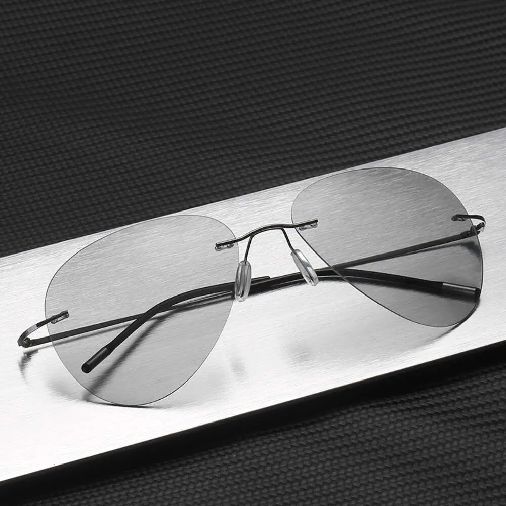 Новые ультра -световые поляризованные безрадовые солнцезащитные очки для мужских очков для матчей дневные и ночные очки.