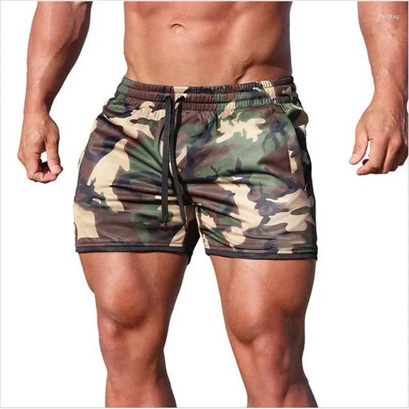 Mäns shorts 2024 Summer Muscle Sports Running Fitness Breattable Sweat Stylish Beach tre minuter