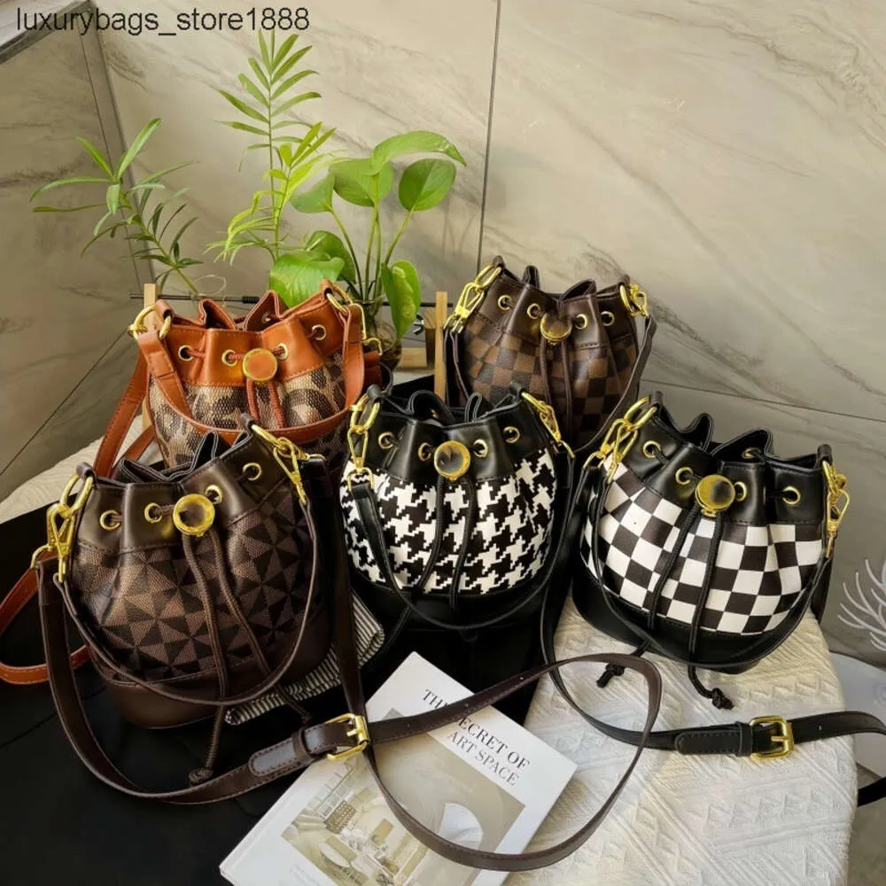 Crossbody drawstring bucket bag on sale