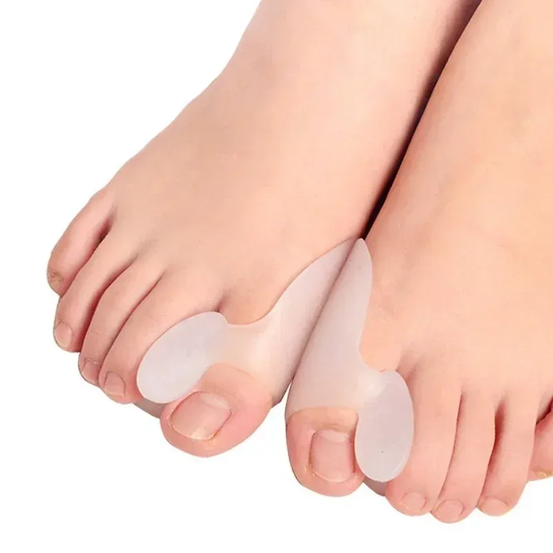 NOUVEAU 2PCS SILICONE GEL CORRECTEUR CORRECTEUR BUNION FOOD TEE HALLUX VALGUS PROTECTEUR Séparateur Finger Dingener Adjustateur Pied Care Tool pour Bunion Foot Toe Séparer