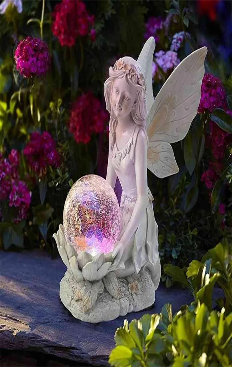 庭の装飾太陽のある妖精の彫像ソーラーLEDライトヤードアートナイトランプフィギュア飾り飾り樹脂エンジェル彫刻家の装飾2101079761