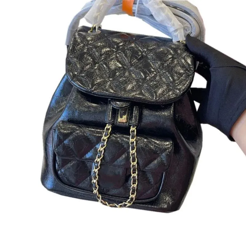 Moda Bolsa de Moda Womens Vintage Backpack de Cera de Cera Vintage French Designer Classic Quilted Hardware xadrez de fivela de fivela Bolsa de ombro Luxu qcoj