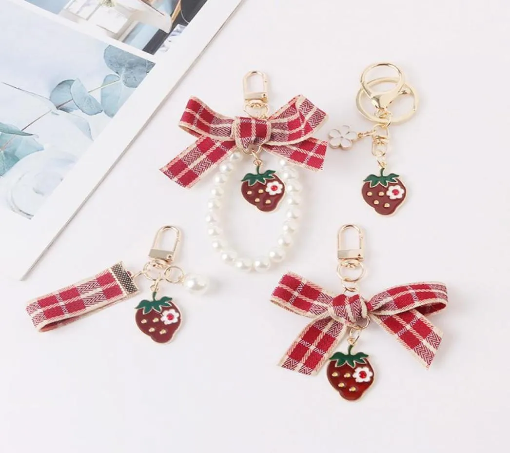 Keychains Lovely Red Plaid Ribbon Strawberry Keychain Women Girl Jewelry Simulated Fruit Bowknot Bag Car Key Holder Keyring Birthd5050734