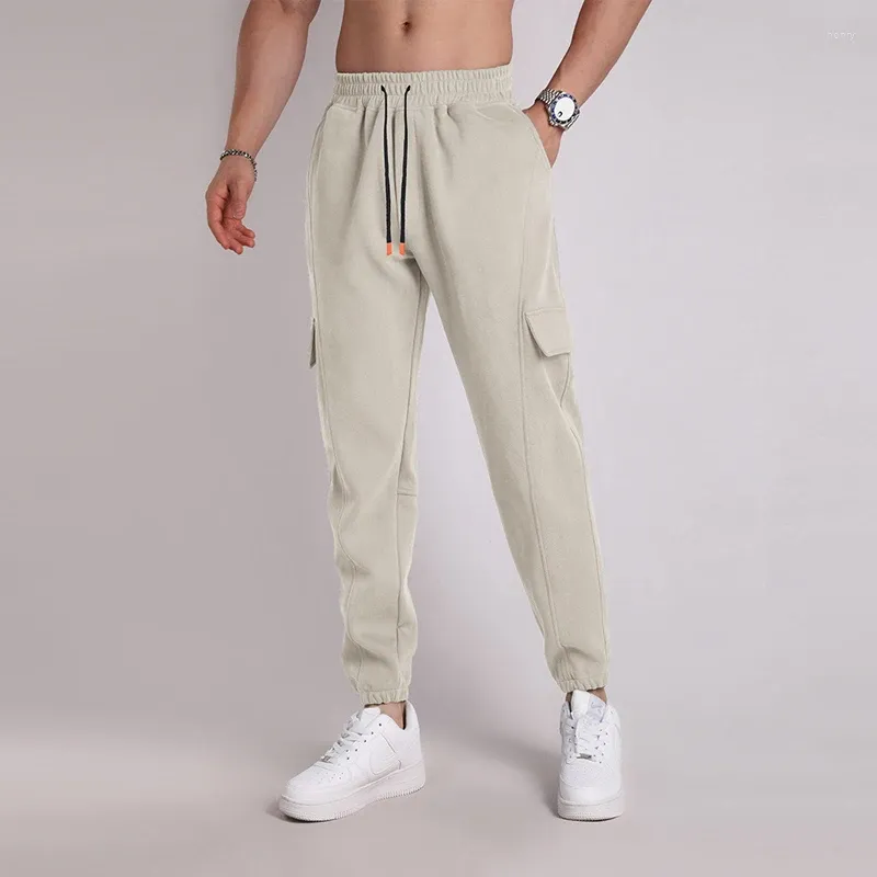 Pantalon de pantalon pour hommes plus taille grande taille xxxl wearwear élastique toit décontracté pantalon extensible pantalon mâle joggeurs noirs masculins