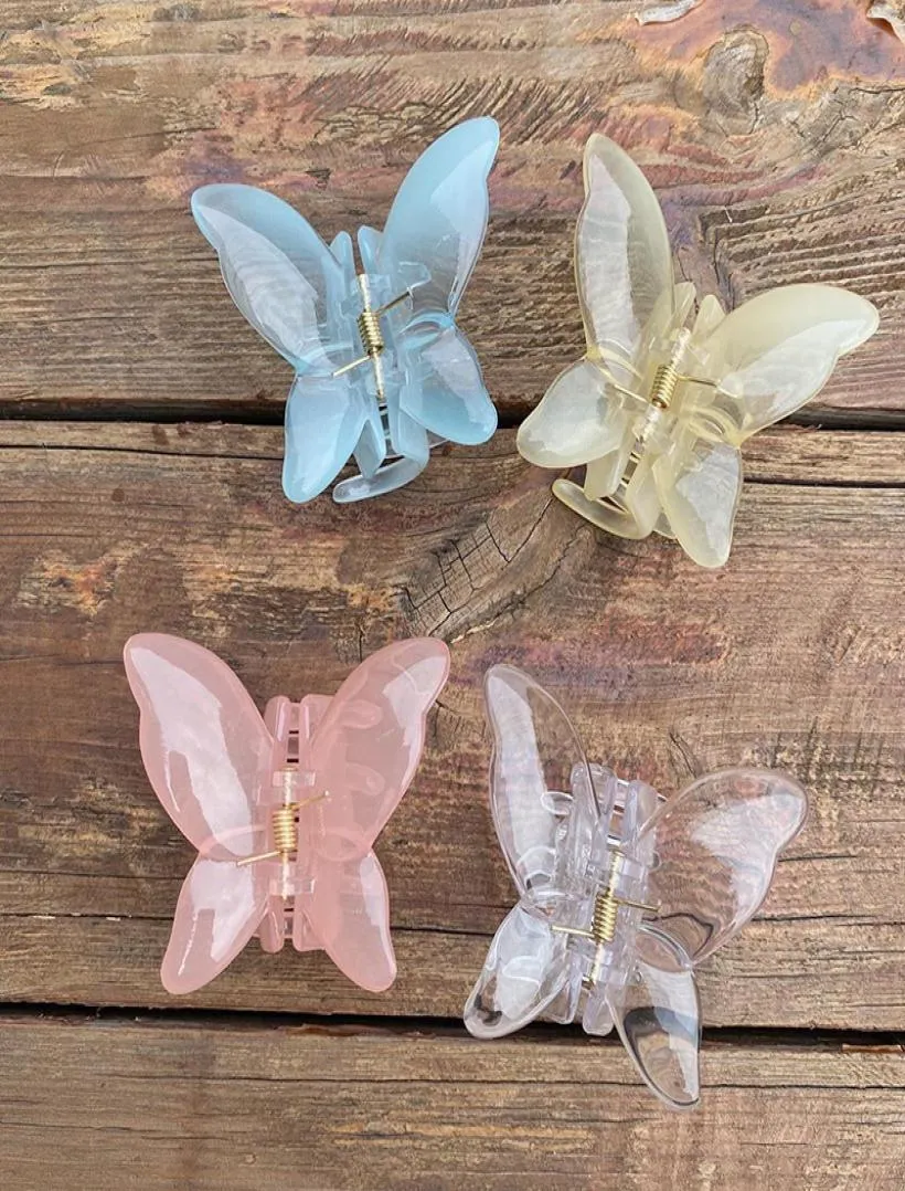 Yamog Small Transluzy Butterfly Model Haarklemme Frauen Plastik -Süßigkeiten reine Farbkrallen Clips Weibliche Tierrunzeln Pferdeschwanz H5909534