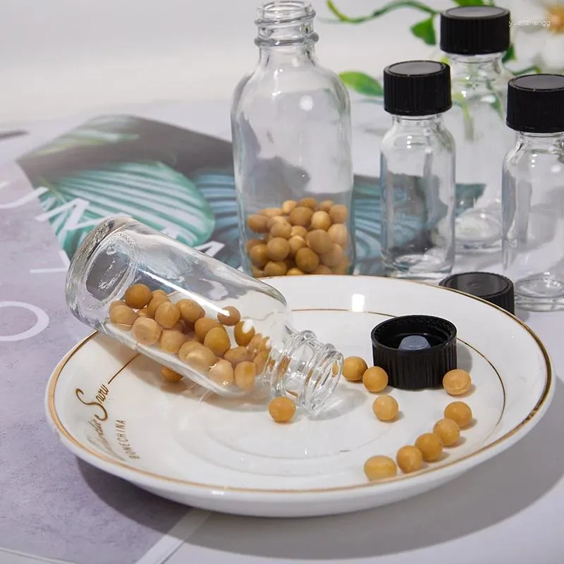 Bouteilles d'eau 6pcs petit verre transparent avec des couvercles récipients échantillon rond pour les huiles de jus de gingembre