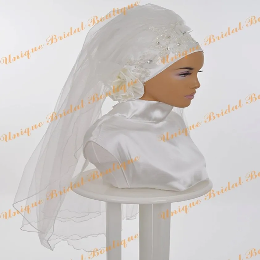 Arabia Saudita Velo de novia 2019 con flores de mano y borde de corte Fotos reales Apliques Tulle Romantic Muslim Wedding Hijab para Islámico Wom 2538