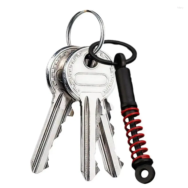 Partag Favor Spring Absorber Keychain Car Lovers de nouveauté Keyrings avec des clés de trait de partie automatique pour les sacs à dos