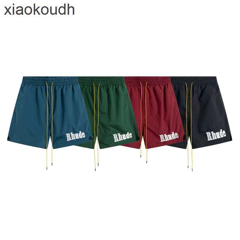 ストリートファッションのためのrhudeハイエンドデザイナーショーツソリッドカラースポーツショーツ男性用刺繍ビーチパンツ1：1のオリジナルラベルを持つカップル向けのクイックショーツ