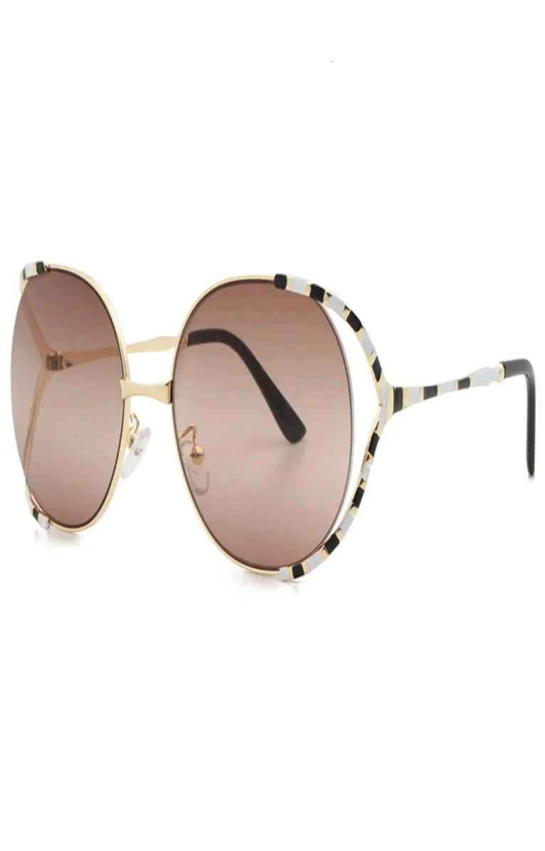 2021 Nowa celebrytka mody w tym samym stylu okrągłe metalowe okulary przeciwsłoneczne GG0595S9000151