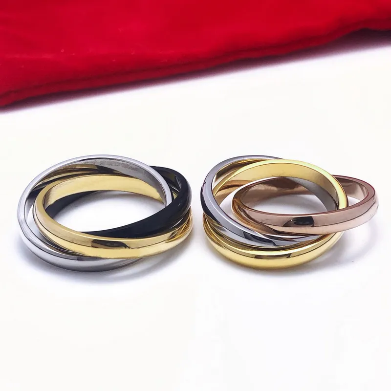 Europe Amérique Men de mode Men de femme Ring Titanium Steel Paramètres Daimond gravés Initiales 3 Cercles 3 Couleurs Anneaux Taille US5-US11