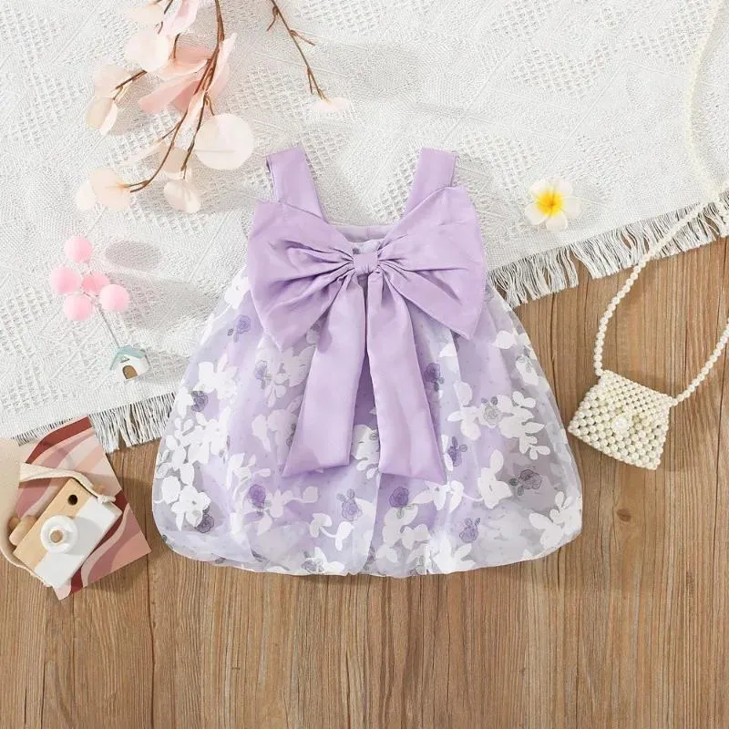 Robes de fille robe de filles d'été pour enfants avec une fleur d'arc couleur couleur solide de style coréen suspension pod jupe enfants 2024 vêtements