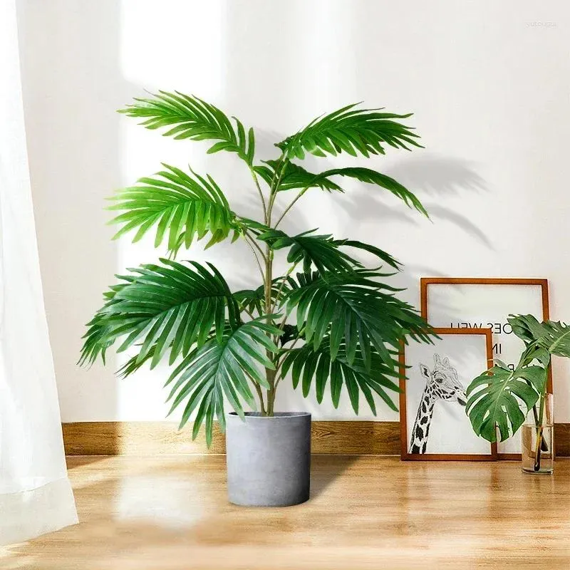 Decoratieve bloemen tropisch palmblad grote boom zonder pot grote kunstmatige planten plastic nepplant huizen tuin buiten woonkamer kantoor