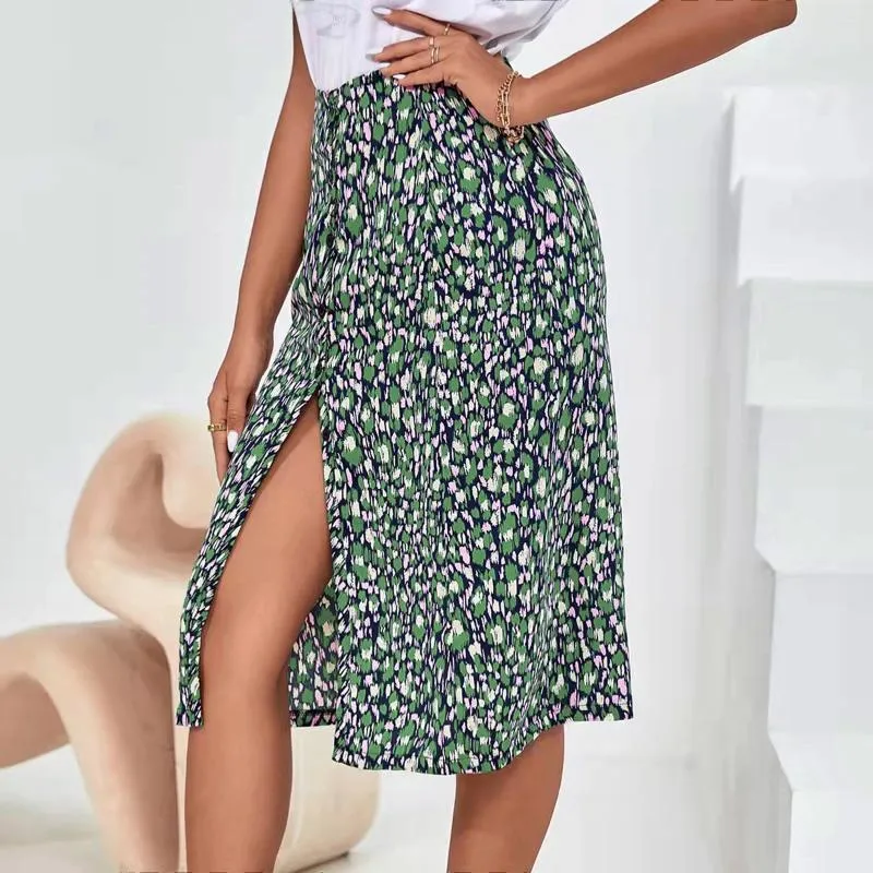 Jupes 2024 Femmes Summer Emballé Vêtements de vacances à la plage taille haute imprimé floral divisé de jupe midi décontractée femme sexy