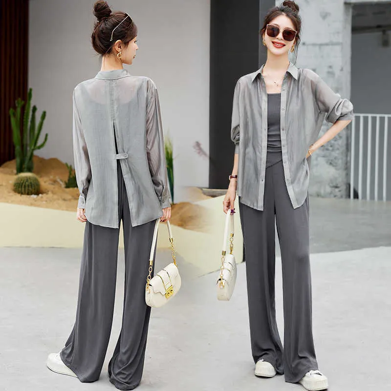 2024 Sommar Ny europeisk casual mode Solskyddsmedel Sky Silk Shirt Floor Slam Pants Three Piece Set For Women Youmi