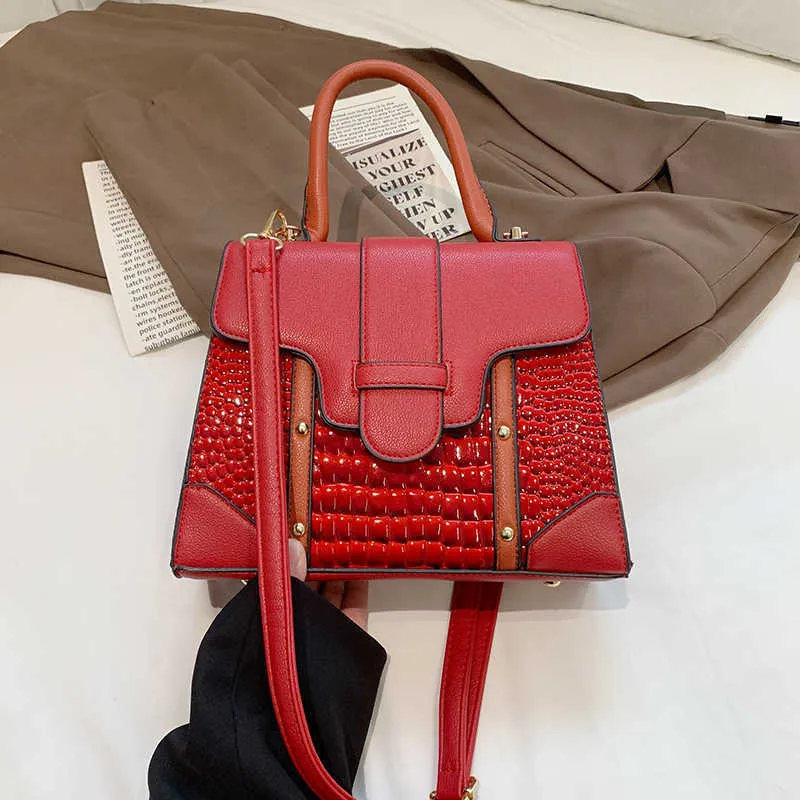 Axelväskor lyxdesigner handväskor väskor kvinnor äkta saigon högkvalitativa läderväskor på klassiska resor crossbody axelväska handväska