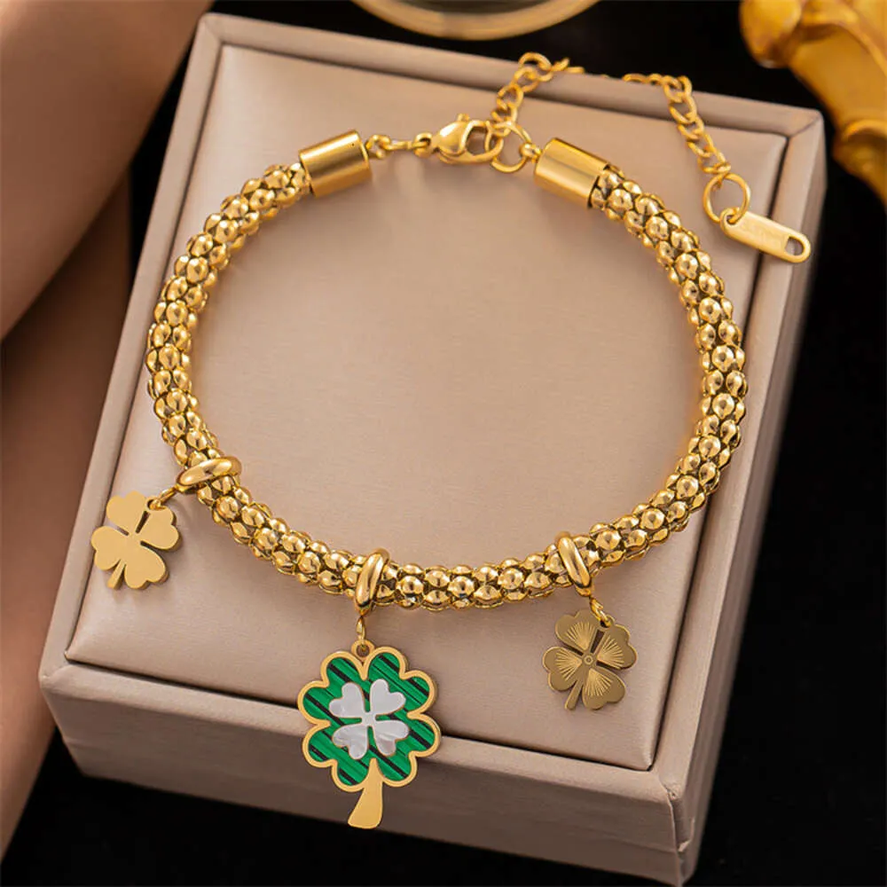 Wholesale Cuban Titanium Steel Gold Non Tarnish Waterproof Seashell Four Leaf Clover Bracelet Women