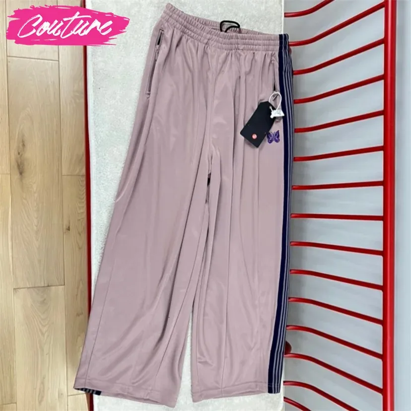 Pantalon large à rayures tricotées violet hommes femmes brodées pantalon papillon rose brun japon harajuku pantalon 240511