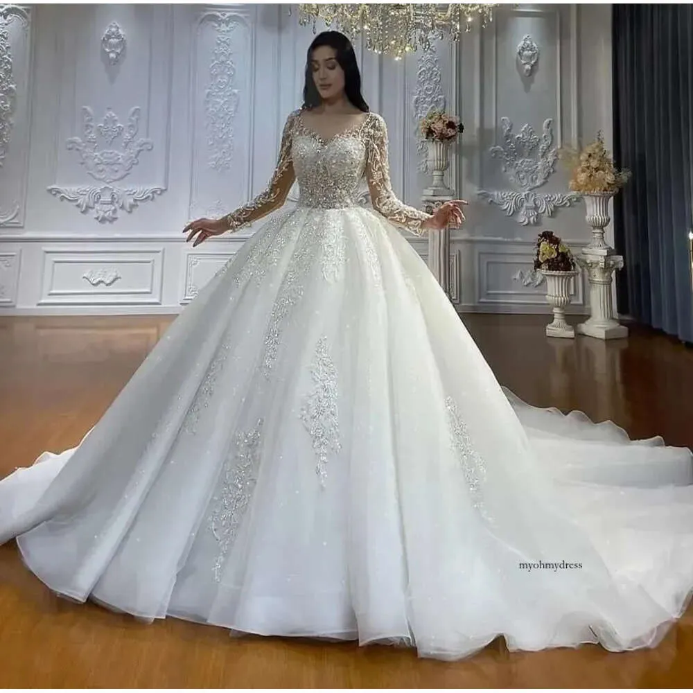 2024 vestidos de bola vestidos de noiva contas de cristal ilusão de jóia de jóia de renda de mangas compridas dubai tule tule arabé vestidos de noiva Vestido de noiva espartilho de volta 0513