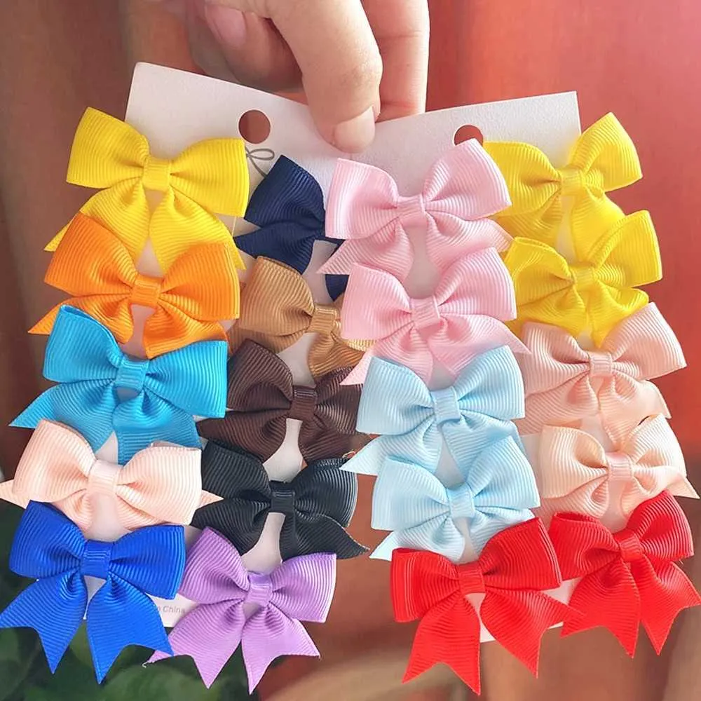 Accessoires de cheveux 10 pièces / Ensemble de nouveaux clips de cheveux à arc à ruban solide adaptés pour les bébés filles arc-arc Clips de cheveux