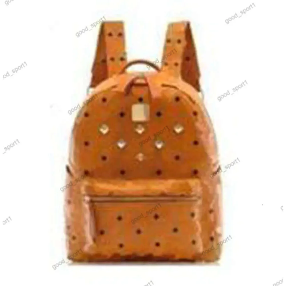 MCM1688 Backapck Leather Handbags en gros de grandes taille, les hommes et les femmes voyagent célèbres Rivet Printing Backpack Designer Lady Sacs Boy Girl School Bag 733