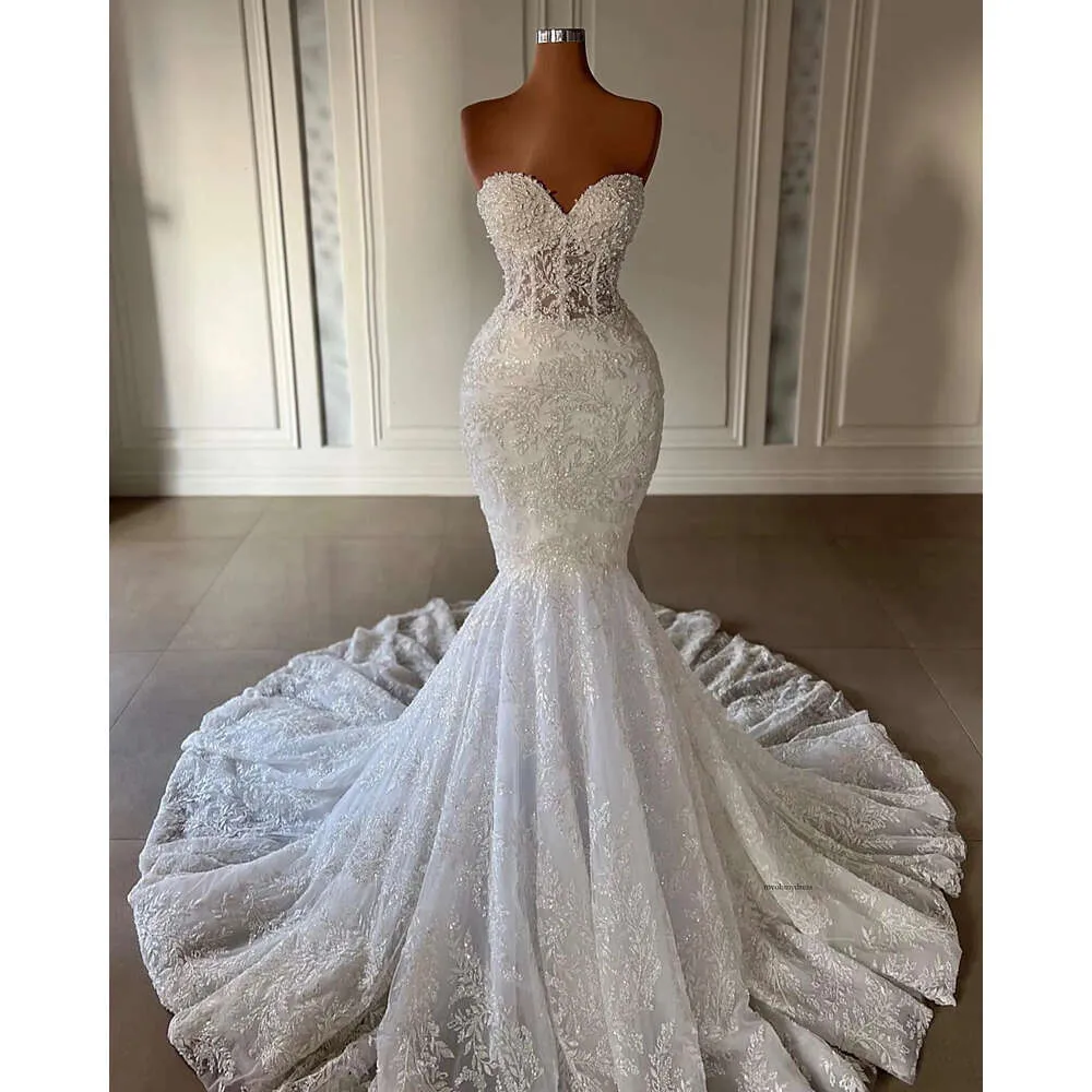 2024 abiti da sposa sirena abiti da sposa illusione illusione appliques a pizzo completo perle di cristallo plus size africane nigerian pesce coda 0513