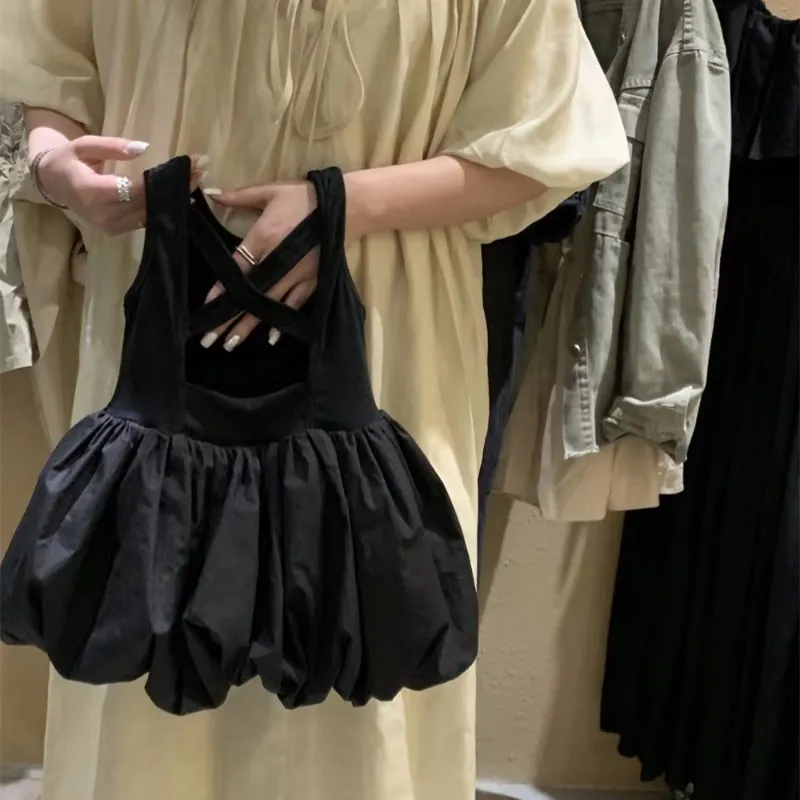 Robe pour enfants Girls Summer Robe sans dos Version coréenne de la robe de gilet de fleur bébé robe d'été robe pompeuse petite robe noire