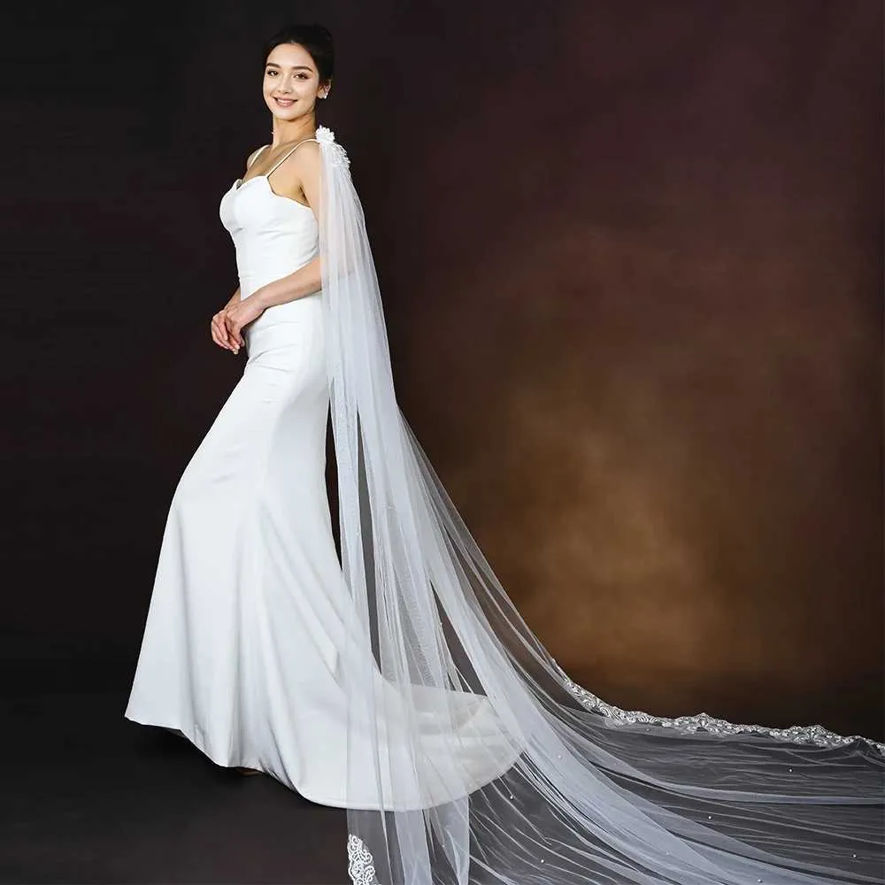 Velo a cappa da sposa per abito da sposa lungo a cattedrale_voghion.com