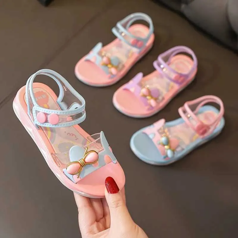 Sandales Summer Little Girls Sandales 2024 Nouvelle fleur Simple Cut Pink Purple Childrens Sandales Soft Loisk