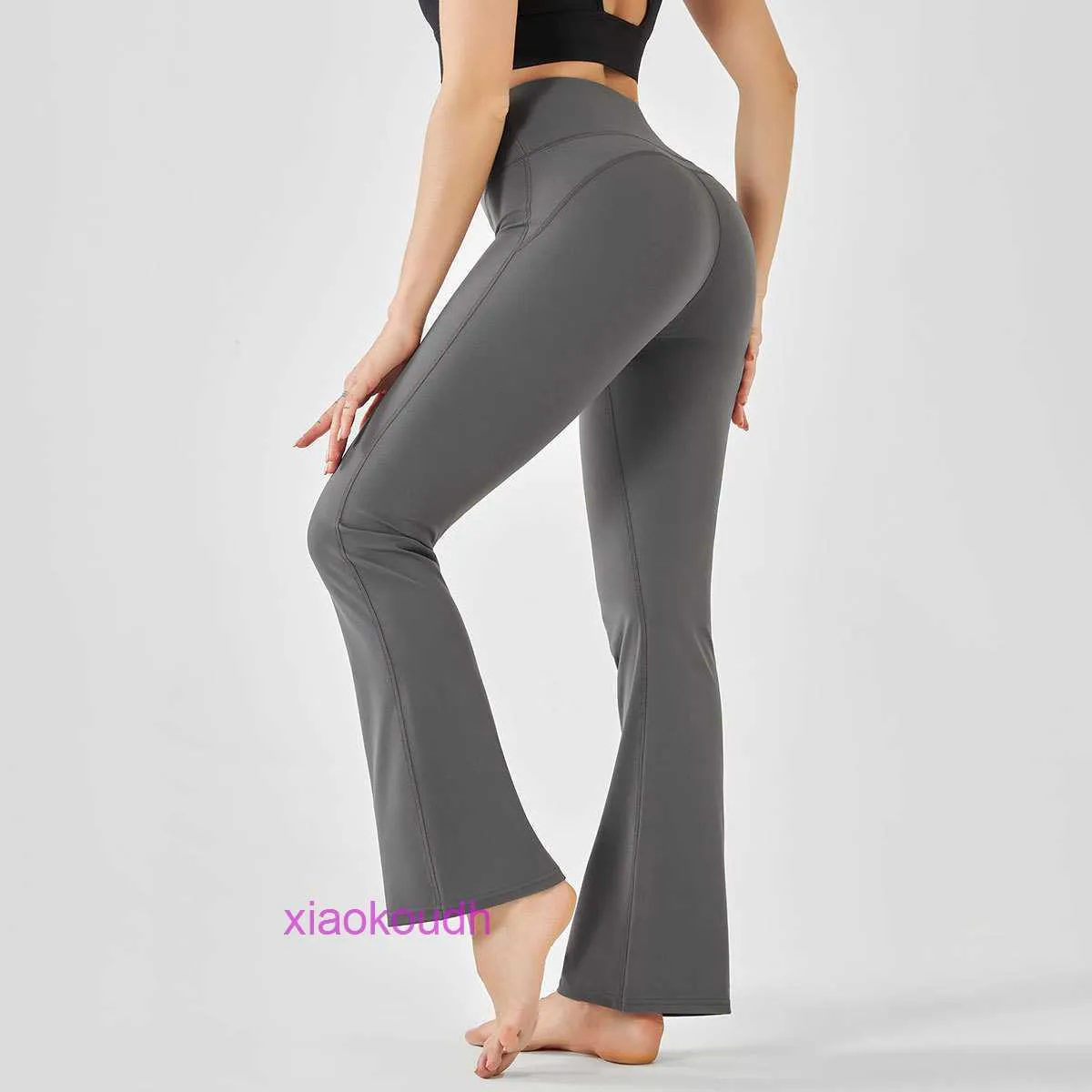 AAA Designer Lul Pantalon de yoga sportif pour femmes confortables 2024 Nouvelles femmes Wear Double face nylon Sentiage soulevant la hanche serrée neuf divisions larges de la jambe