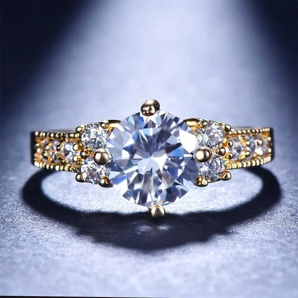 Bröllopsringar Sparkling White Zircon Round Stone Wedding Ring Lämplig för kvinnor Vintage Gold Engagement Luxurious Crystal Jewelry Mothers Gift Q240511