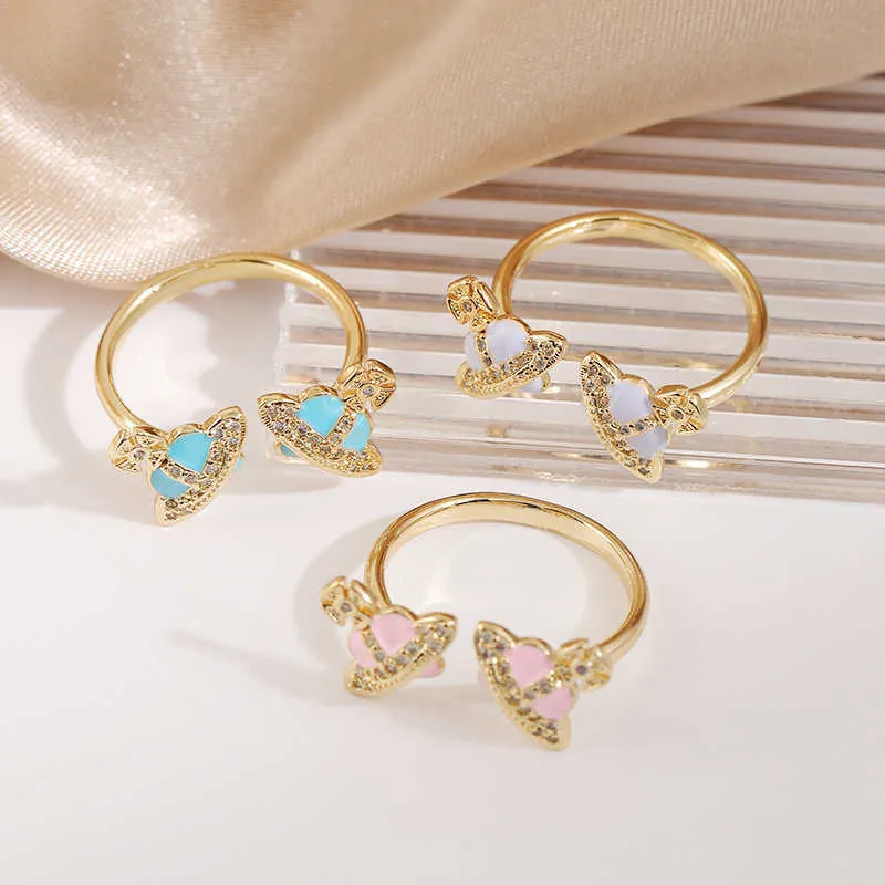 Designer Light Luxury 18k Gold Plated Westwoods Ring smycken Fashionabla Micro Set med full diamant Saturn sweet och personlig hantverk för kvinnor nagel