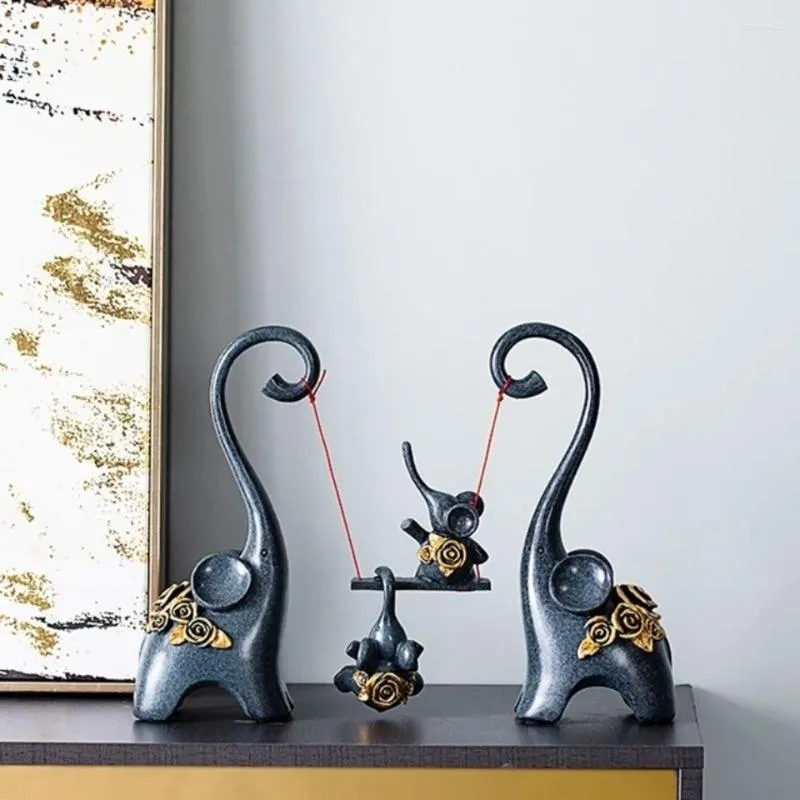 装飾的な置物象の象の彫刻装飾家の装飾誕生日お土産クラフト両親のための抽象家族像樹脂スイング