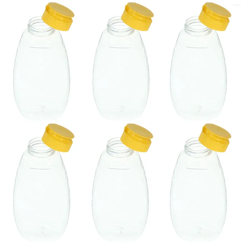 Lagringsflaskor 6 st såspress containrar flaska honung burk husdjuret klara sylt plast ketchup burkar