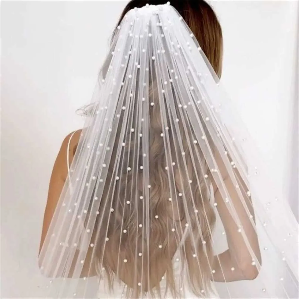 Bruidssluier met parels en kam voor bruiloft kathedraal lengte_voghion.com