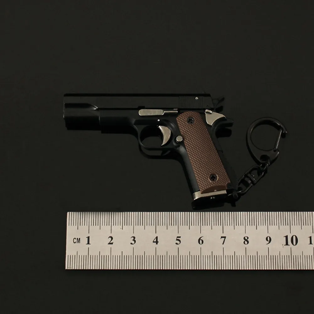 1: 3 Modelo de pistola de pequenas pistola Ornamento de arremesso destacável Shell 1911 Keychain Semi -Alloy Sup