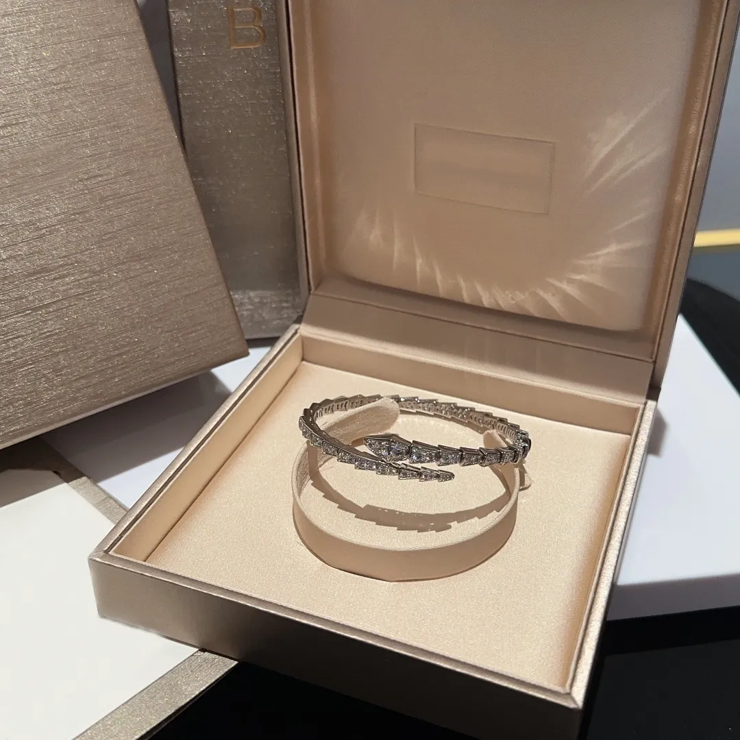 Designer slang volledige diamantarmbanden ontwerper Hoogwaardige roestvrijstalen zilveren slang mannen Bangle Gold Gold Women Open Style Wedding Sieraden Gift B027