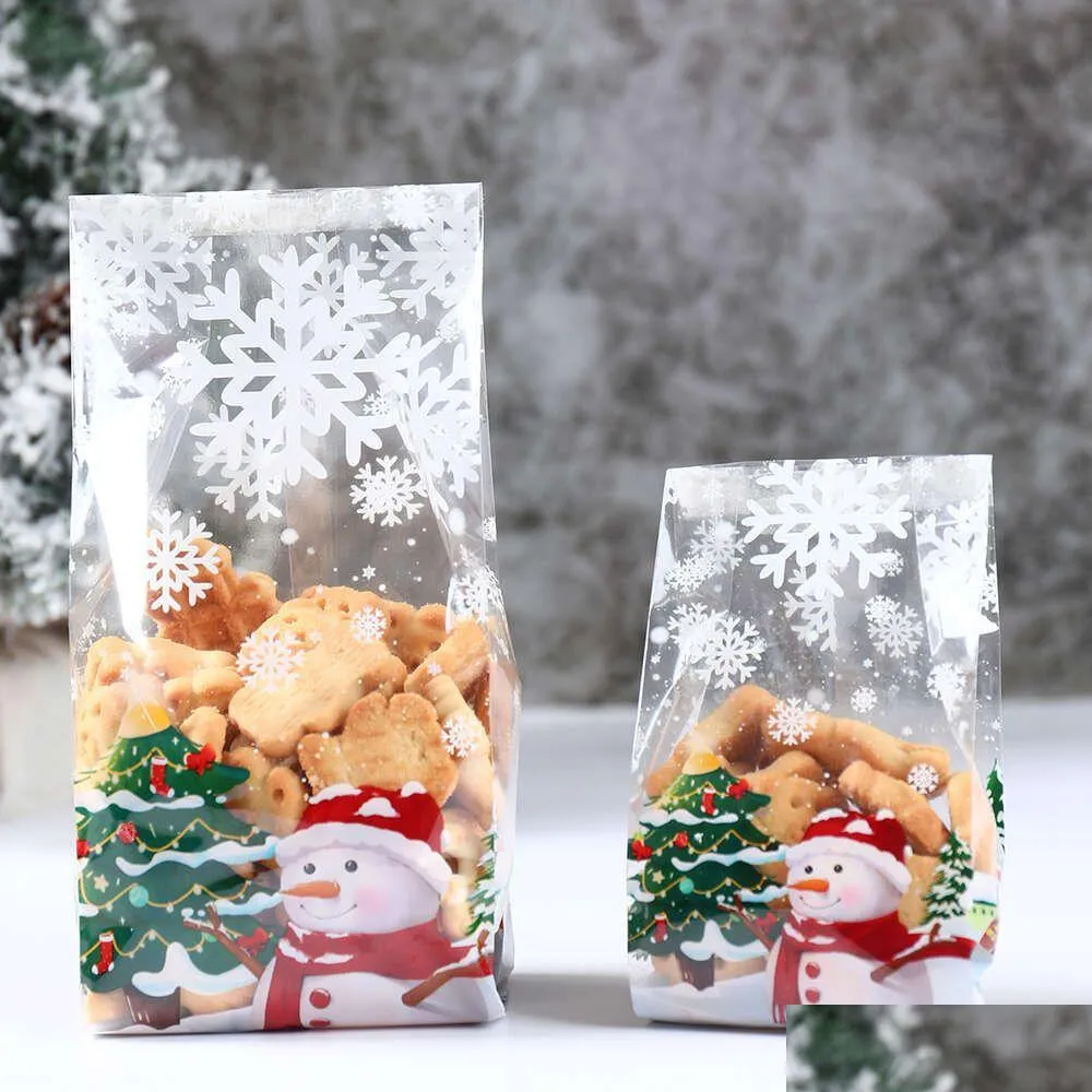 Faux Floral Greenery Upgrade 50pcs Śliczne Snowman Plastic Gifts Bags Candy Cookie Pakowanie torba Wesołych Świąt Rok zima P dhpci