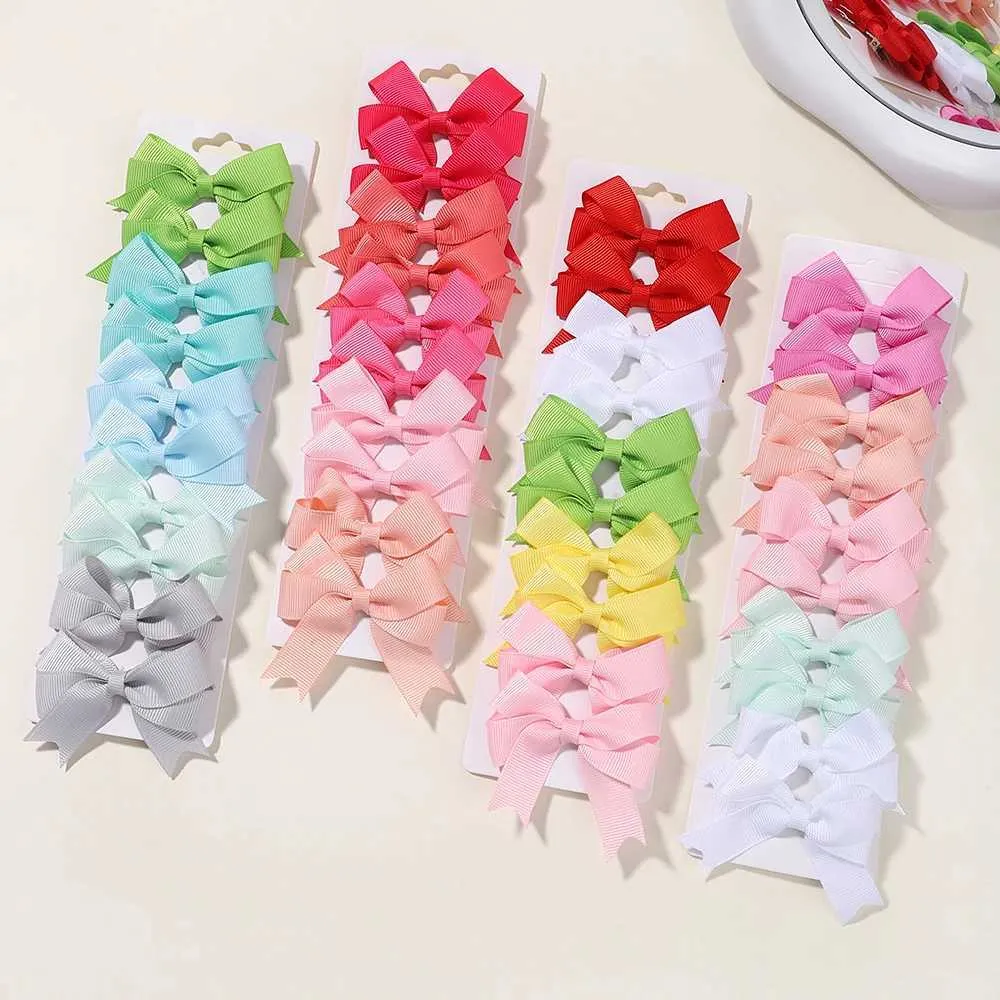 Accessoires de cheveux 10pcs / ensemble NOUVELLE-NÉBORNE COLOBLE COILLE DE CHEUR BOWKNOT POUR FILLES MAINS MAINS BARRETTES CHEPINGS COLES CHEUR