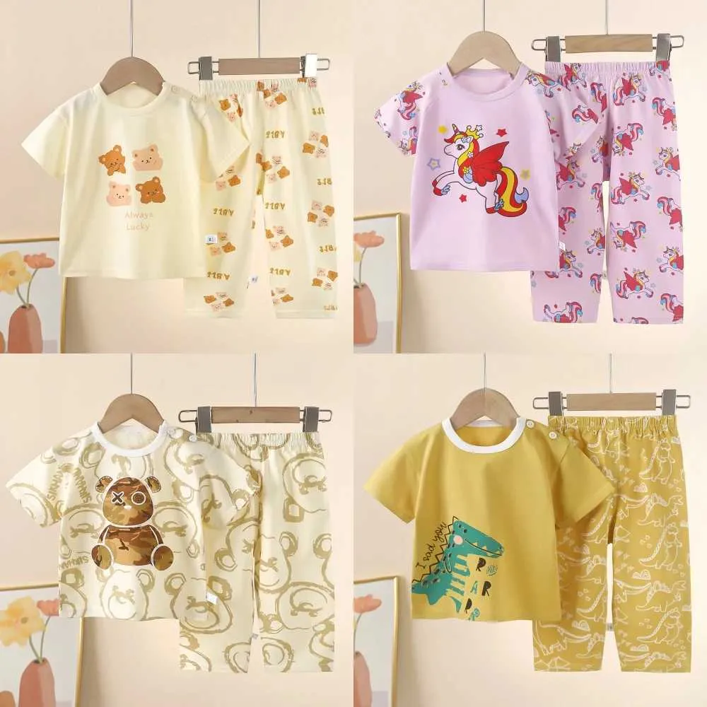 Pajamas 2024 Nouveau enfant à manches courtes Set Pure Coton Summer Boys T-shirt Girls Clothing Baby Pajamas Childrens Clothingl2405