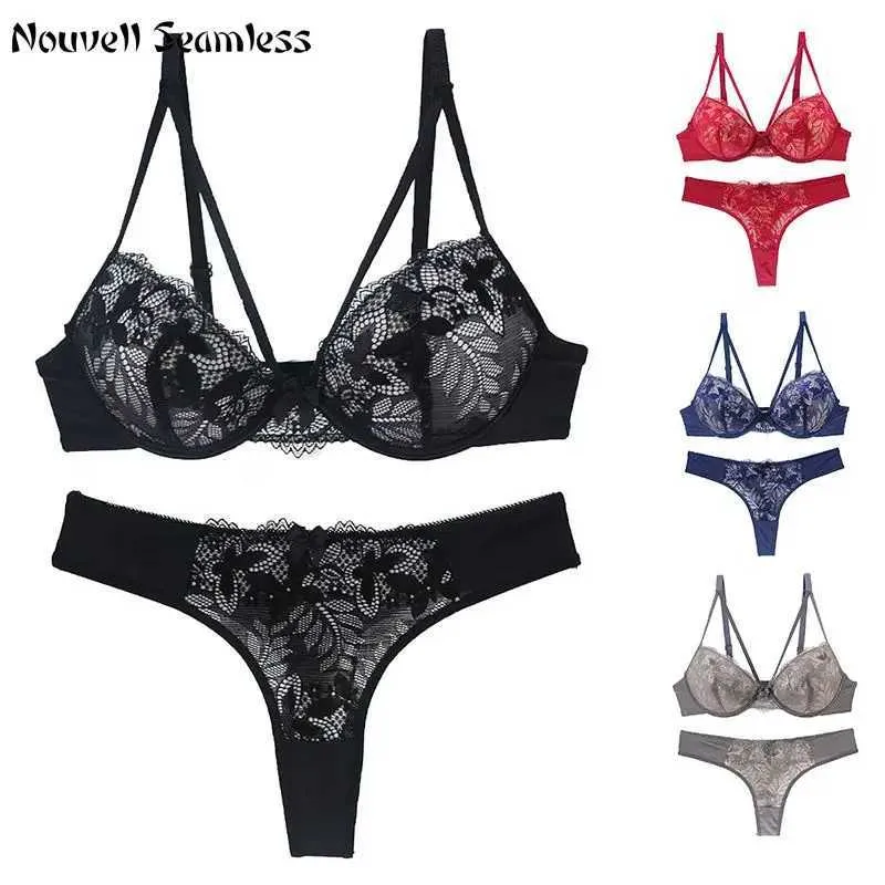 Reggiseni set nouvelle senza cucitura da donna sexy reggiseno usato per spingere il reggiseno fiore in pizzo abito da sera imbottito di filo top top dimensione Y240513