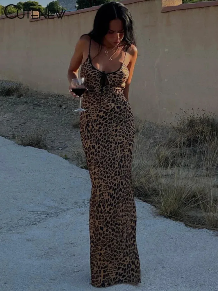 Schattige dames luipaard geprinte maxi jurk elegante spaghetti riem backless kanten robe robe skinny retro jurken vestidos 240514
