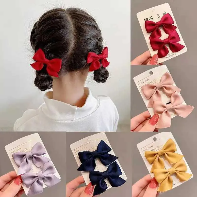 Hårtillbehör 2st söta Bow Kids Hair Clips Sweet Little Girl Hairpins Solid Color Bowknot Barrettes Baby Hair Accessories