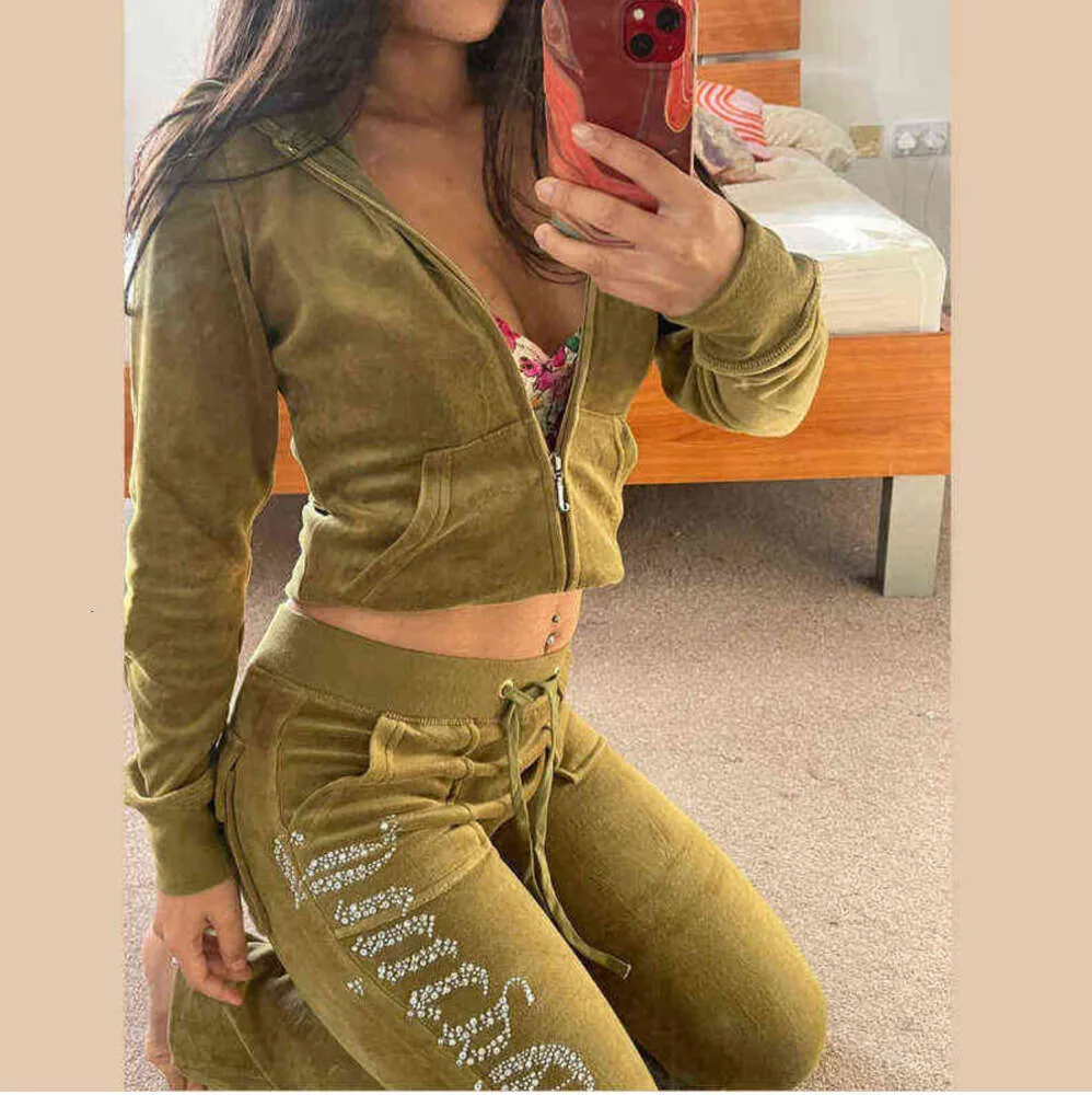 Juicy Womens Tracksuit 2024 Marque d'été Suit de couture Velvet Tracksuit Velor Women Tracks Hoodies and Pants Met Motion Design 6119ess