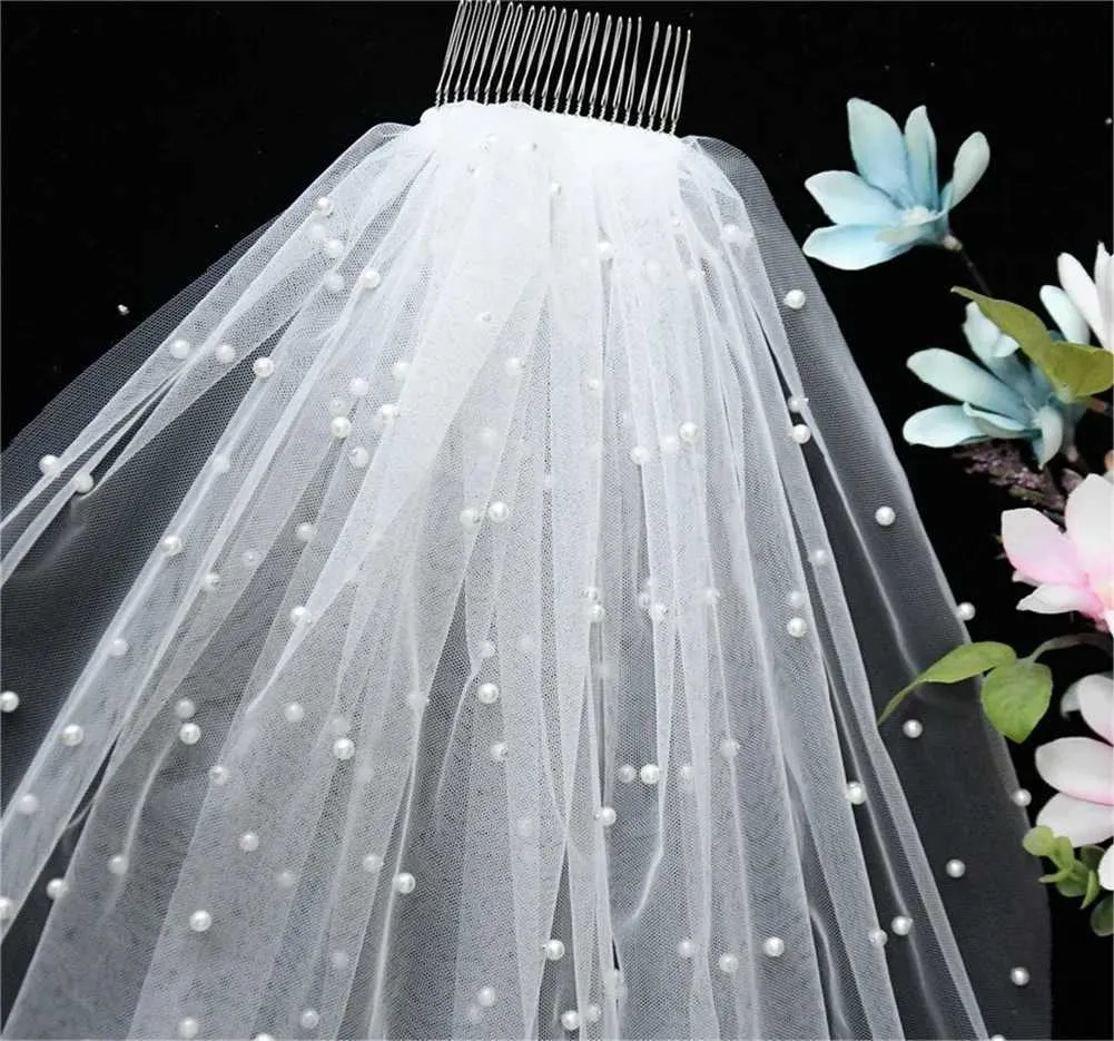 Bruidssluier met parels en kam voor bruiloft kathedraal lengte_voghion.com