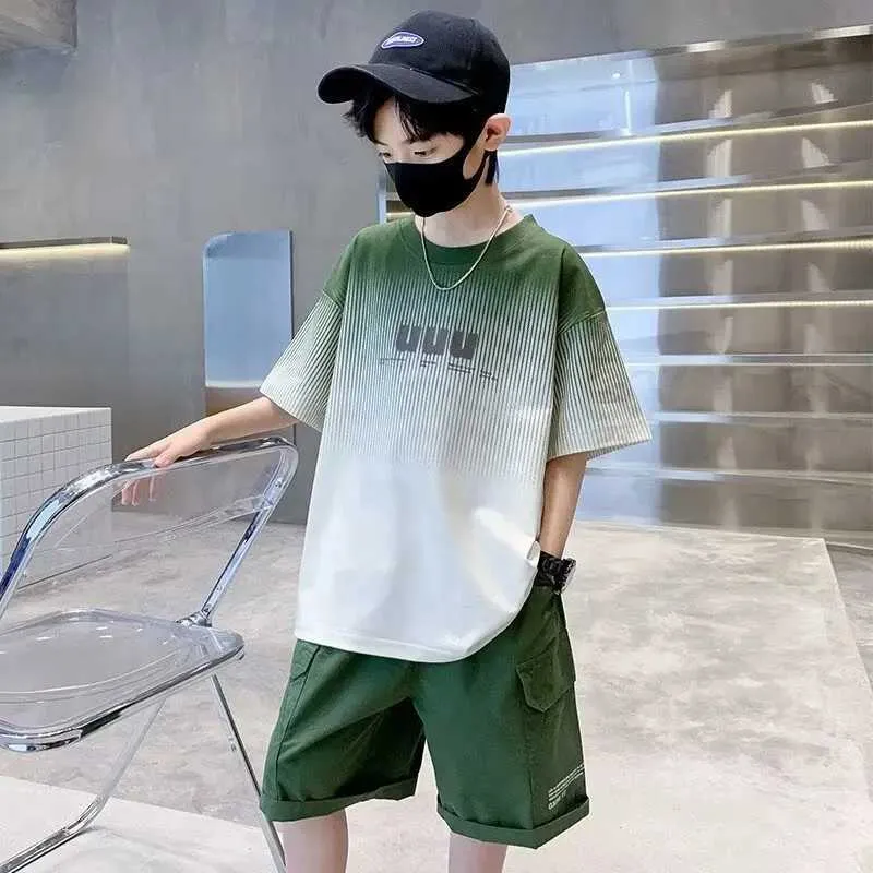 衣料品セット2024夏の男の子と女の子セット韓国ストリートファッションチャイルドレンズTシャツ2ピースセット高品質の子供スポーツウェア新しいD240514